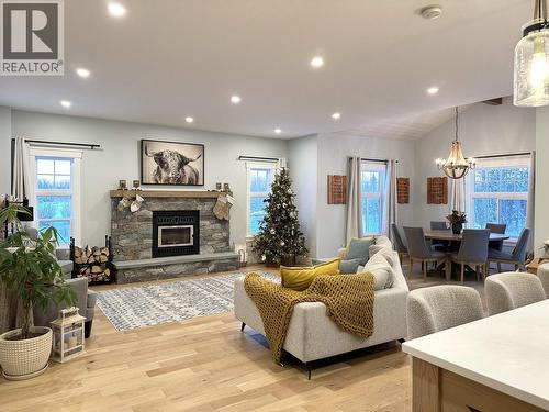 13245 283 Road, Fort St. John, BC - Indoor Photo Showing Living Room With Fireplace