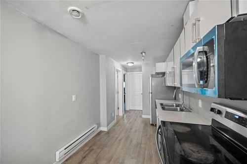 141 Pilgrim Avenue, Winnipeg, MB - Indoor Photo Showing Kitchen With Double Sink