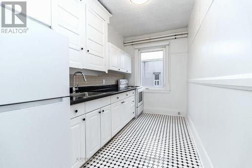 Kitchen View 2 - 27 - 100 Vaughan Road, Toronto, ON - Indoor Photo Showing Kitchen With Double Sink