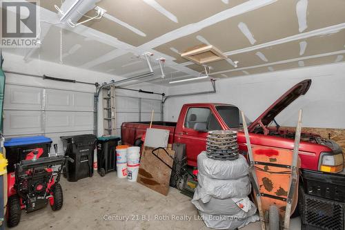 77 Georgia'S Walk, Tay (Victoria Harbour), ON - Indoor Photo Showing Garage