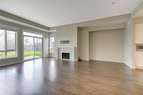 56-680 Old Meadows Road, Kelowna, BC - Indoor Photo Showing Living Room With Fireplace
