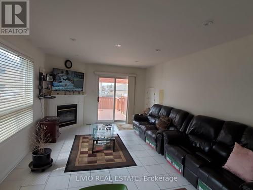 71 Fiddleneck Crescent, Brampton, ON - Indoor Photo Showing Living Room With Fireplace