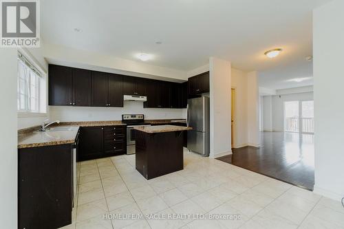 106 Aspen Hills Road, Brampton, ON - Indoor Photo Showing Kitchen With Stainless Steel Kitchen With Double Sink