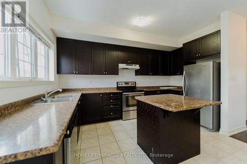 106 Aspen Hills Road, Brampton, ON - Indoor Photo Showing Kitchen With Stainless Steel Kitchen With Double Sink