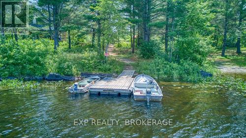 1249 Waters Edge Lane, Frontenac (Frontenac Centre), ON - Outdoor With Body Of Water