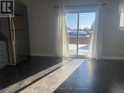 Walk out to deck/ rear yard (south facing) - 