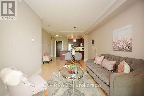 1007 - 100 John Street, Brampton, ON - Indoor Photo Showing Living Room