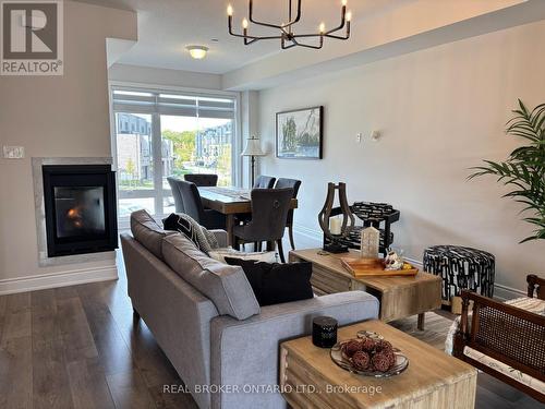 Living area - 113 Marina Village Drive, Georgian Bay, ON - Indoor Photo Showing Living Room With Fireplace