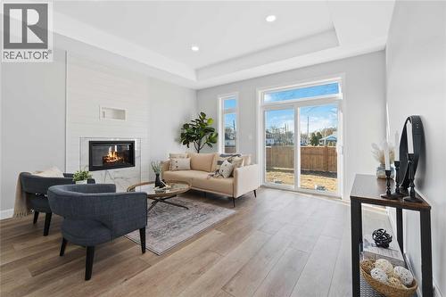 219 Essex Street, Sarnia, ON - Indoor Photo Showing Living Room With Fireplace