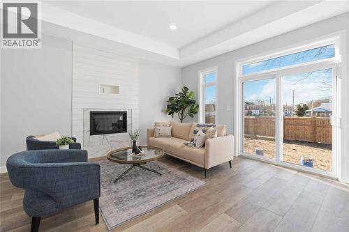 219 Essex Street, Sarnia, ON - Indoor Photo Showing Living Room With Fireplace