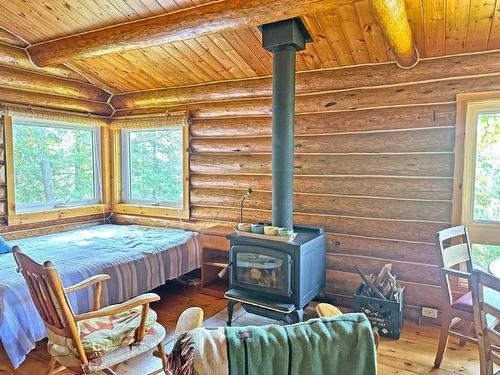 Eagles Nest, Northern Light Lake, ON - Indoor Photo Showing Other Room With Fireplace