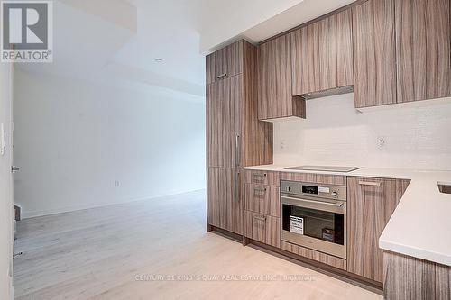 92 - 71 Curlew Drive, Toronto, ON - Indoor Photo Showing Kitchen