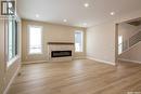 435 Sharma Crescent, Saskatoon, SK  - Indoor Photo Showing Living Room With Fireplace 