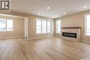 435 Sharma Crescent, Saskatoon, SK  - Indoor Photo Showing Living Room With Fireplace 