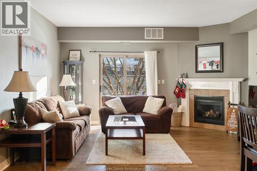 5995 Ellis Street Unit# 202, Lasalle, ON - Indoor Photo Showing Living Room With Fireplace
