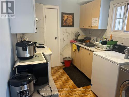 102 - 67 Abitibi Avenue, Toronto, ON - Indoor Photo Showing Laundry Room