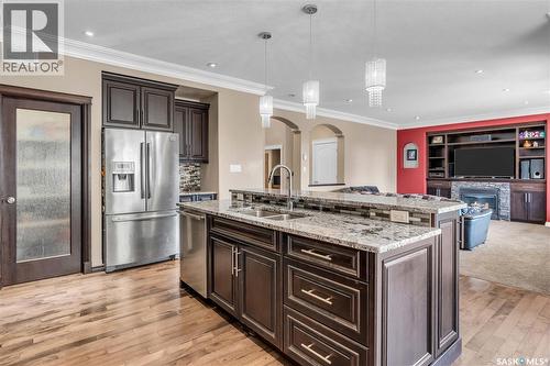 3969 Sandhill Crescent, Regina, SK - Indoor Photo Showing Kitchen With Stainless Steel Kitchen With Double Sink With Upgraded Kitchen