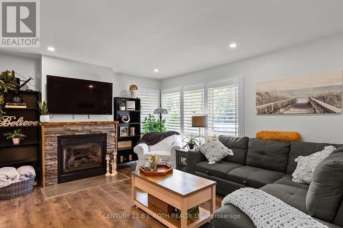 1551 Gill Road, Springwater, ON - Indoor Photo Showing Living Room With Fireplace