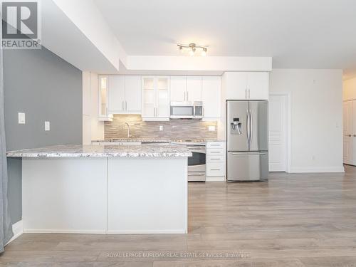 418 - 128 Garden Drive, Oakville, ON - Indoor Photo Showing Kitchen With Stainless Steel Kitchen With Upgraded Kitchen