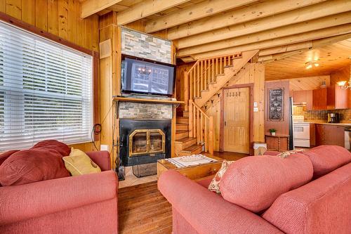 Overall view - 6884 Rue De La Rivière, Val-Morin, QC - Indoor Photo Showing Living Room With Fireplace