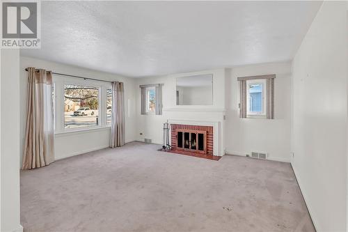 224 Spanish River Drive, Espanola, ON - Indoor Photo Showing Living Room With Fireplace