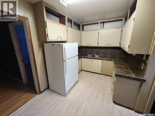 508 1St Avenue E, Lampman, SK - Indoor Photo Showing Kitchen With Double Sink