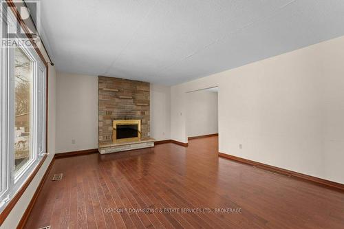 873 Danbury Road, Kingston (South Of Taylor-Kidd Blvd), ON - Indoor Photo Showing Living Room With Fireplace