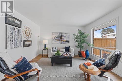 173 - 777 Ashwood Drive, Kingston (South Of Taylor-Kidd Blvd), ON - Indoor Photo Showing Living Room With Fireplace