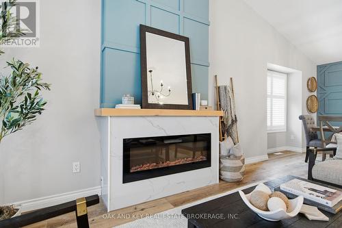 2 - 4067 Colonel Talbot Road, London South (South V), ON - Indoor Photo Showing Living Room With Fireplace