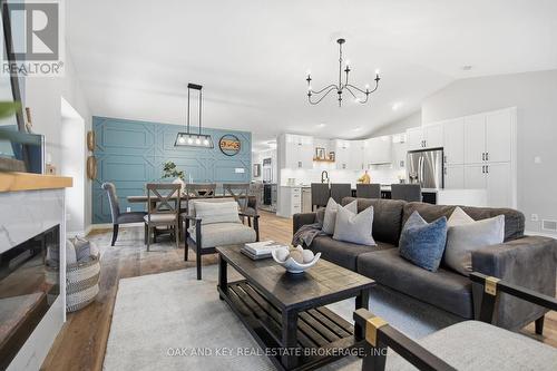 2 - 4067 Colonel Talbot Road, London South (South V), ON - Indoor Photo Showing Living Room With Fireplace