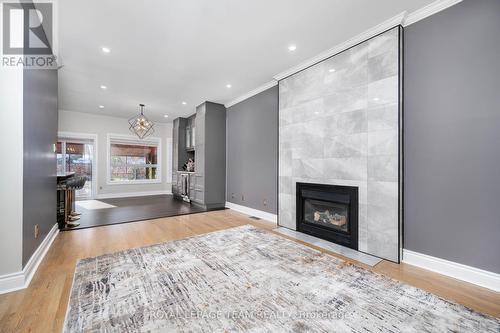 115 Grandpark Circle, Ottawa, ON - Indoor Photo Showing Living Room With Fireplace
