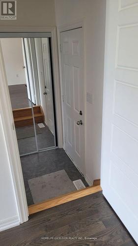 Walkdown to laundry room and garage entrance - 192 Tango Crescent, Newmarket, ON - Indoor Photo Showing Other Room
