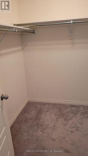 Primary BR W/I Closet - 192 Tango Crescent, Newmarket, ON - Indoor With Storage