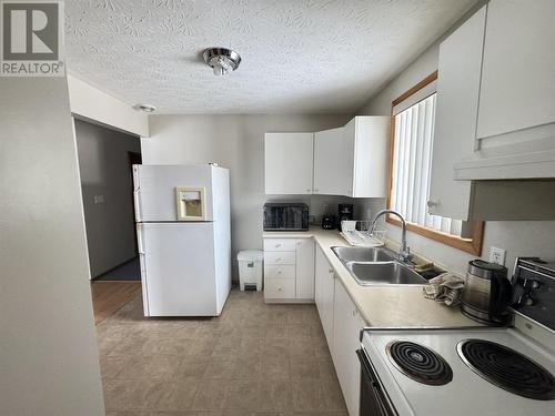 49 Third Ave, Hornepayne, ON - Indoor Photo Showing Kitchen With Double Sink