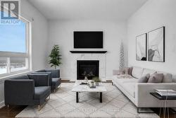 Family Room withfireplace- virtually staged photo - 