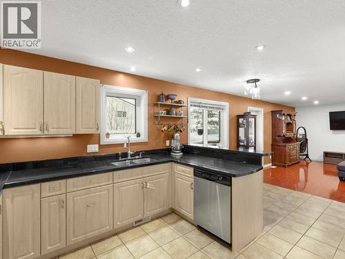 40 Stope Way, Whitehorse, YT - Indoor Photo Showing Kitchen With Double Sink