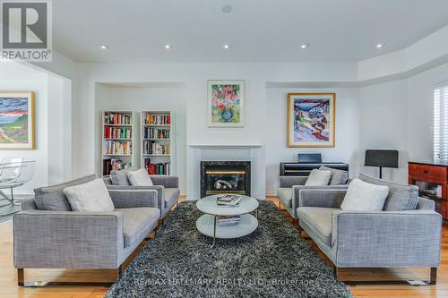 Stylish Living Room - 10 Filmic Lane, Toronto, ON - Indoor Photo Showing Living Room With Fireplace