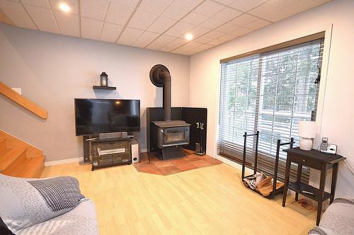 Living room - 13134 Ch. Du Lac-Labelle, Labelle, QC - Indoor With Fireplace