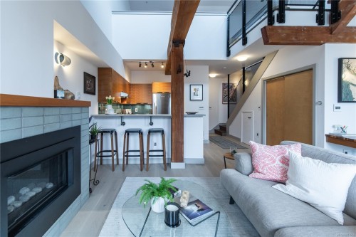 317-599 Pandora Ave, Victoria, BC - Indoor Photo Showing Living Room With Fireplace