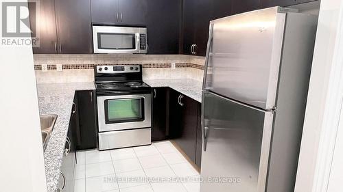 502 - 383 Main Street E, Milton, ON - Indoor Photo Showing Kitchen With Stainless Steel Kitchen
