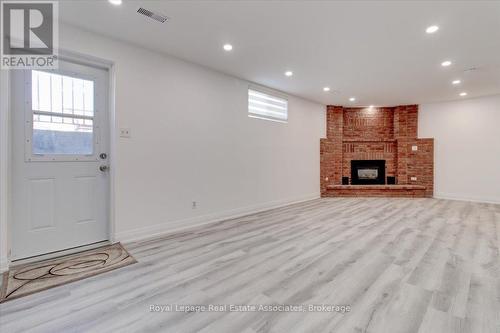 1562 Upper Ottawa Street, Hamilton, ON - Indoor Photo Showing Other Room With Fireplace