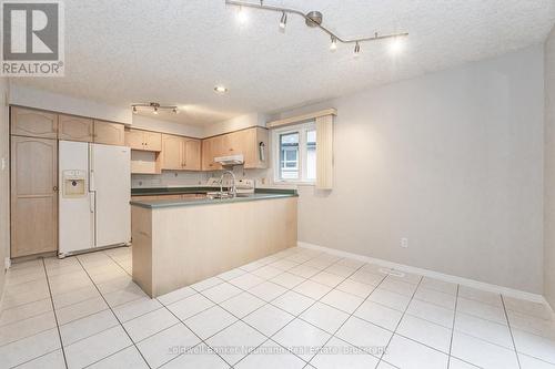 Upper - 18 Whittaker Court, Guelph (Kortright Hills), ON - Indoor Photo Showing Kitchen With Double Sink