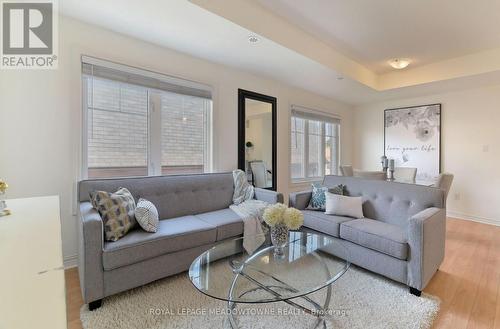 1704 - 2420 Baronwood Drive, Oakville, ON - Indoor Photo Showing Living Room