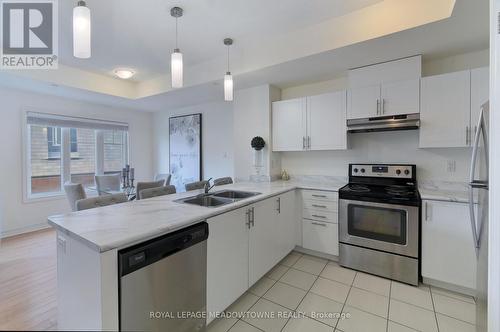 1704 - 2420 Baronwood Drive, Oakville, ON - Indoor Photo Showing Kitchen With Stainless Steel Kitchen With Double Sink With Upgraded Kitchen
