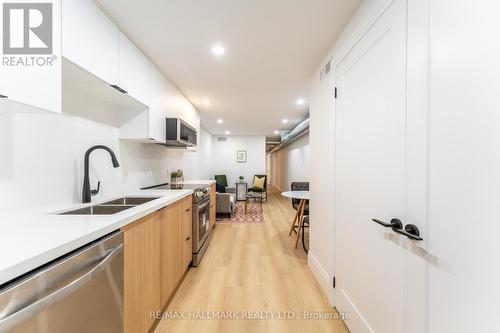 Bsmnt - 700 Adelaide Street W, Toronto, ON - Indoor Photo Showing Kitchen With Double Sink With Upgraded Kitchen