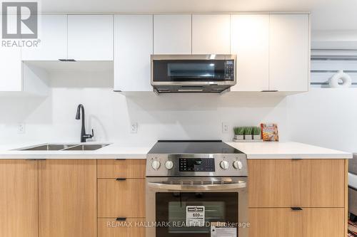 Bsmnt - 700 Adelaide Street W, Toronto, ON - Indoor Photo Showing Kitchen With Double Sink