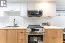 Bsmnt - 700 Adelaide Street W, Toronto, ON  - Indoor Photo Showing Kitchen With Double Sink 