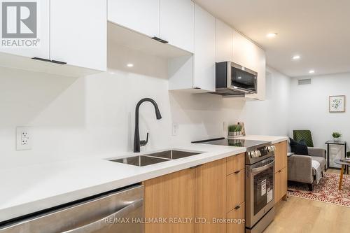 Bsmnt - 700 Adelaide Street W, Toronto, ON - Indoor Photo Showing Kitchen With Double Sink With Upgraded Kitchen