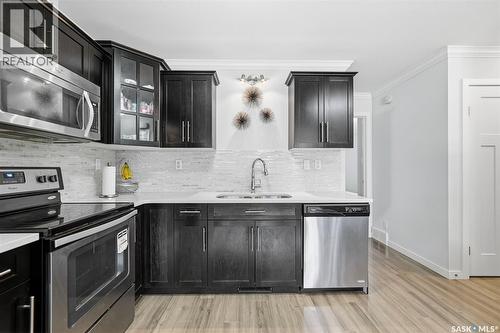 329 620 Cornish Road, Saskatoon, SK - Indoor Photo Showing Kitchen With Stainless Steel Kitchen With Double Sink With Upgraded Kitchen
