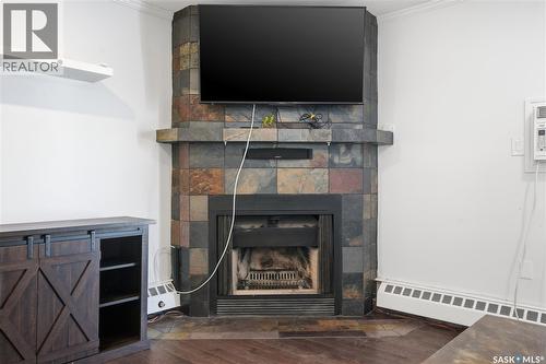 309 3410 Park Street, Regina, SK - Indoor With Fireplace